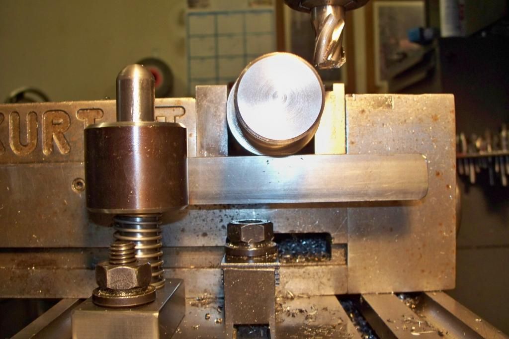 Milling wrench flats on piston rods